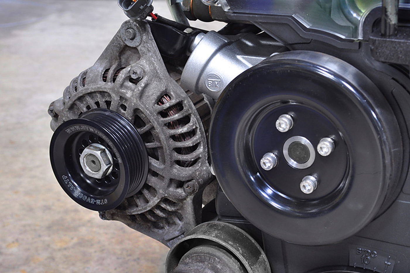 STM Under-Driven Alternator Pulley with Raised Guides for Evo 4-9 *Backorder ETA 05/2026*